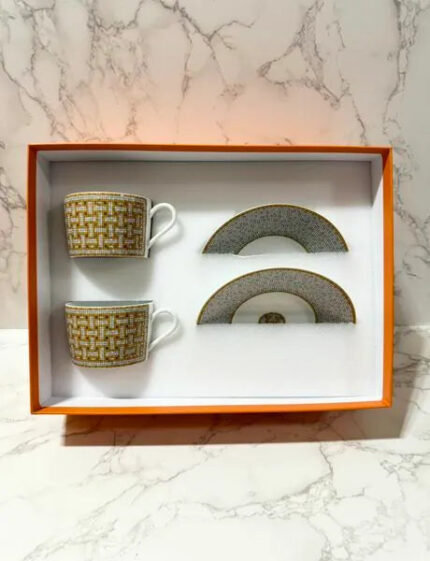 Hermes Mosaique au 24 gold tea cup and saucer
